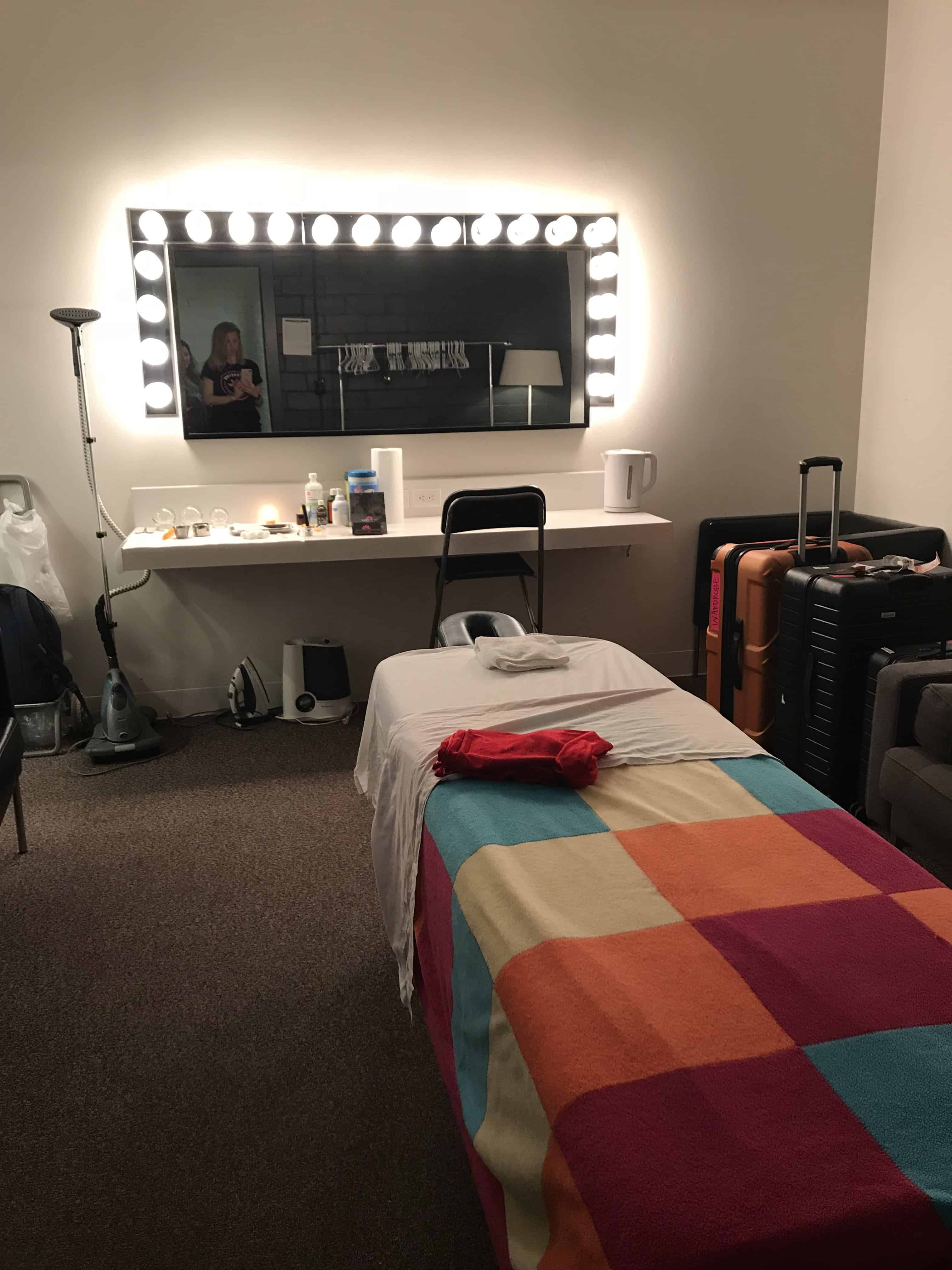 Replicating the best downtown acupuncture massage table clinic set up backstage at massey hall before the Haim concert